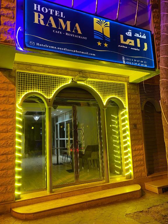 a store front with a sign on a building at Hotel Rama in Oued Laou
