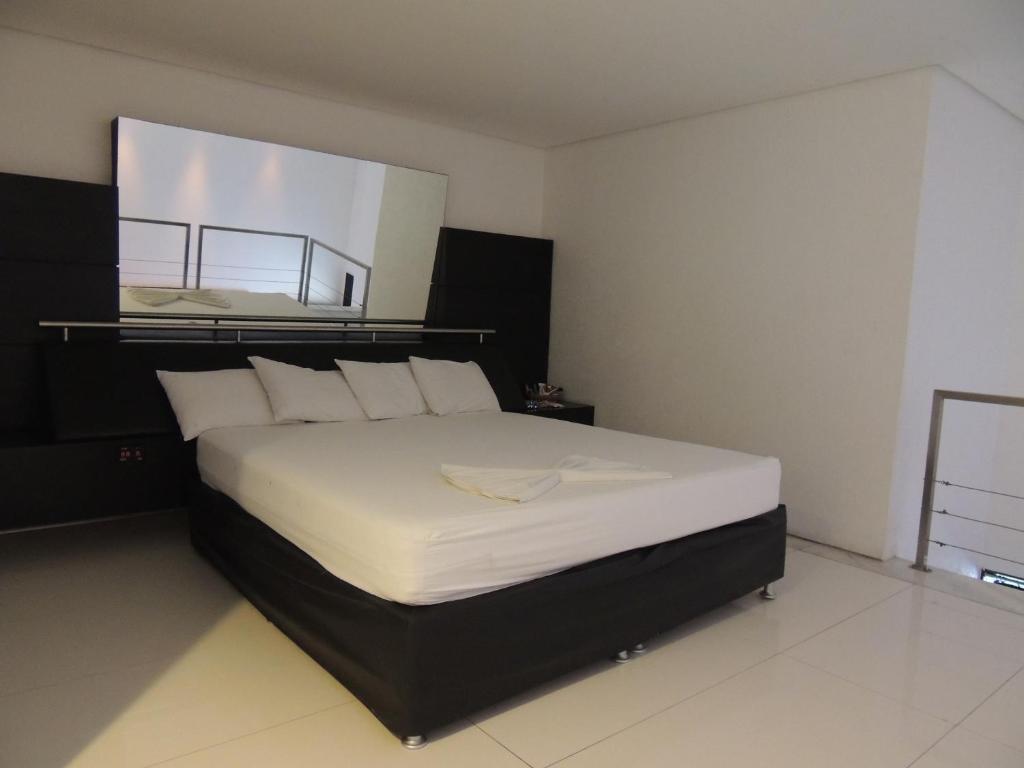 Postel nebo postele na pokoji v ubytování Palace Fortaleza Centro de Eventos motel