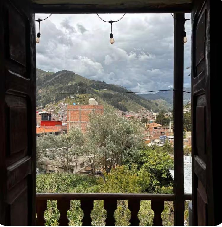 a view of a city from a window at Tarmeñita VIP in Tarma