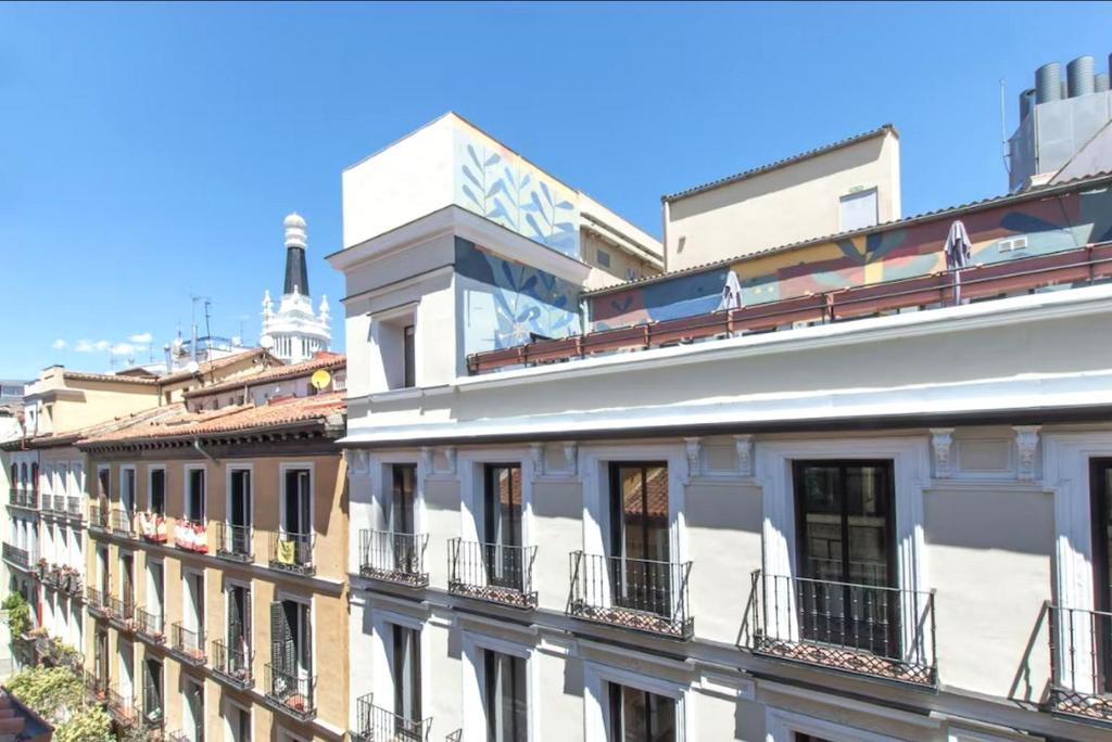 a building with balconies on the side of it at Amseltim in Madrid