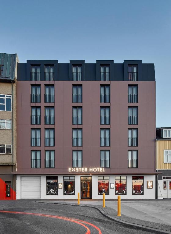 a large building with a street in front of it at Exeter Hotel in Reykjavík