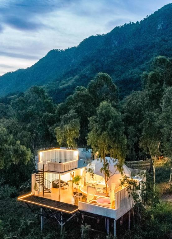 a house with a view of the mountains at Paradiso Khaokho By N in Ban Huai Phai