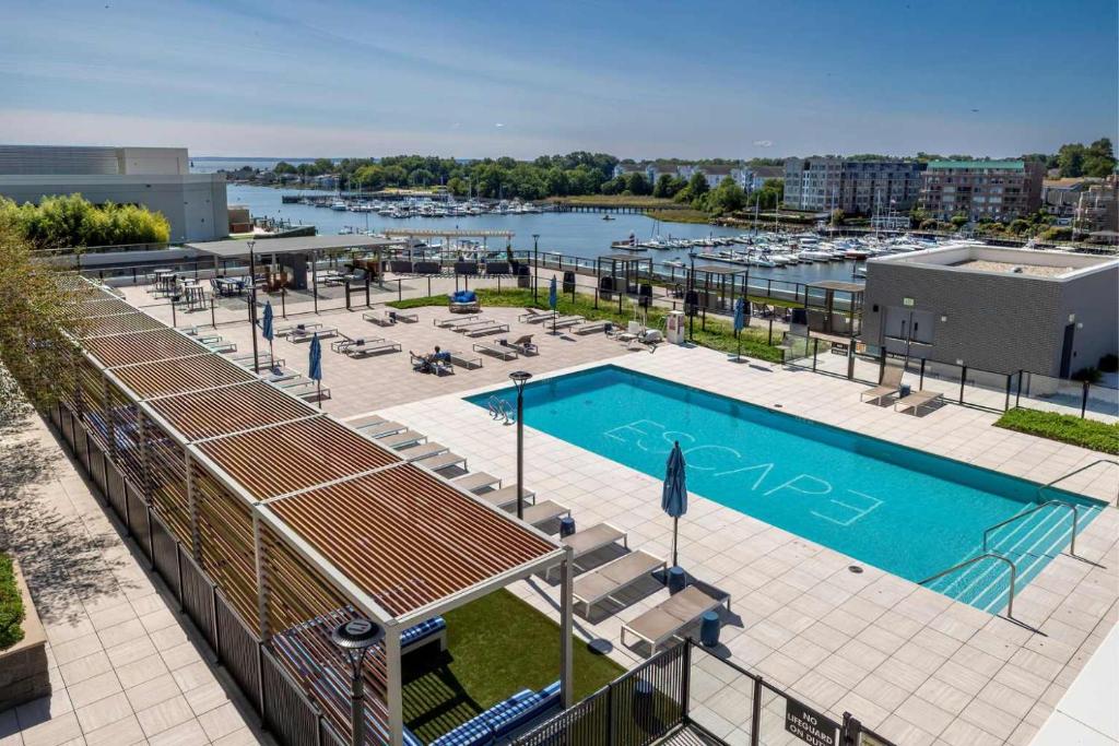 an overhead view of a pool at a marina at Gorgeous Apt w Harbor Views & Gym in South End