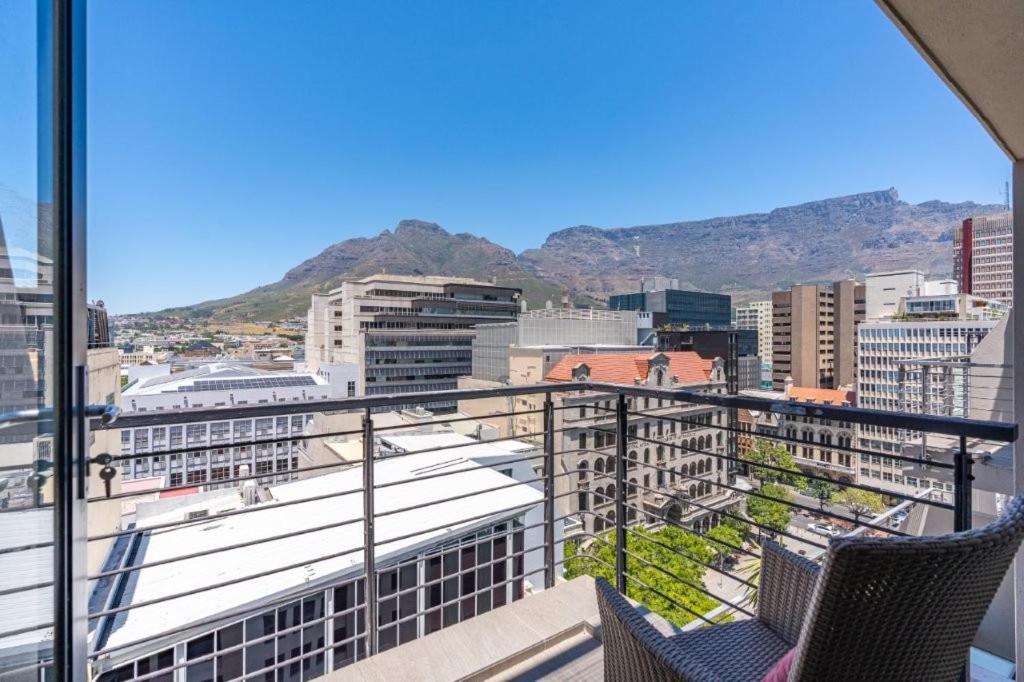 a view of a city from a balcony at Skyline Living, Table Mountain Views in Cape Town
