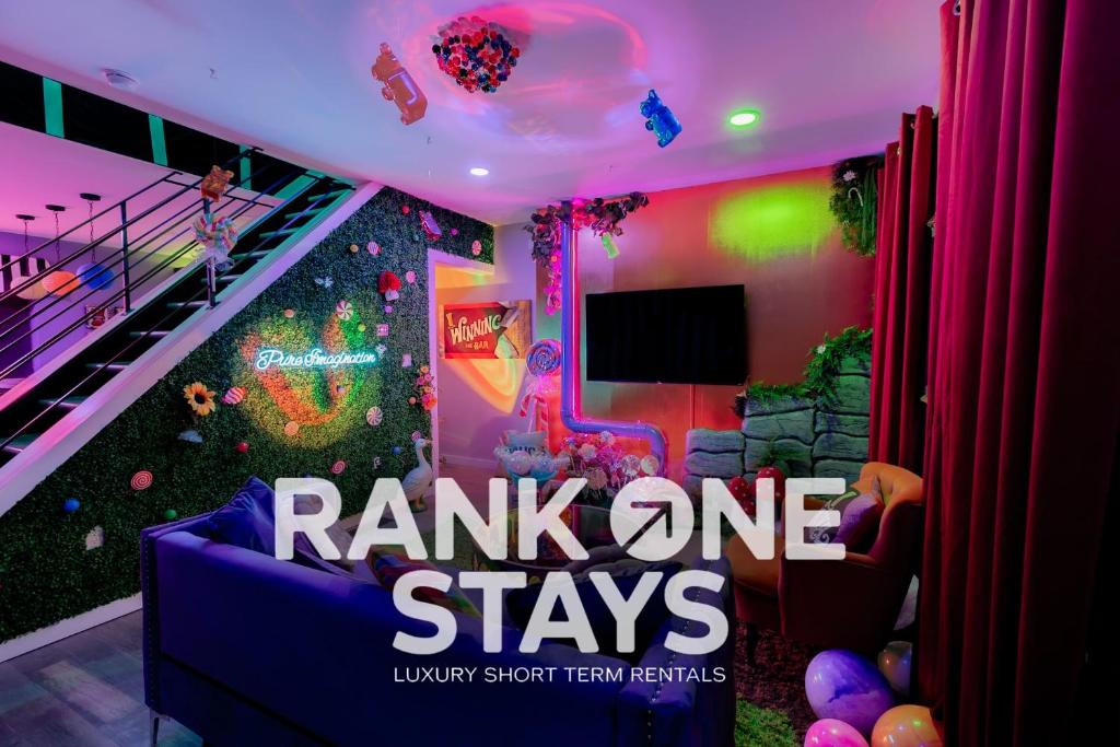 a room with a panic one stays sign in a living room at Famous Willy Wonka Themed Home in Pittsburgh
