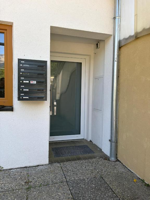 an open door of a building with a window at Patrycja 2 in Ehenbichl