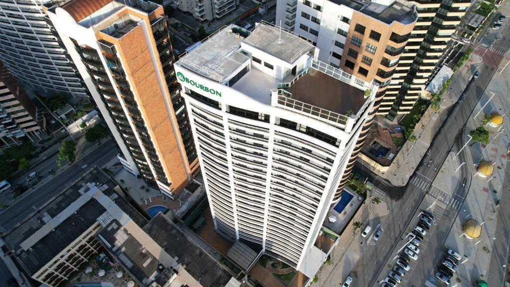 an overhead view of a tall building in a city at Bourbon Hotel Fortaleza in Fortaleza