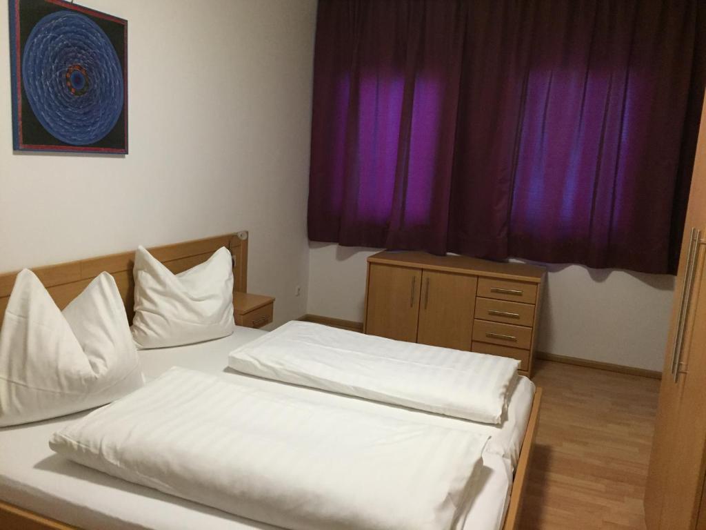 Posteľ alebo postele v izbe v ubytovaní Appartement Feinsinn