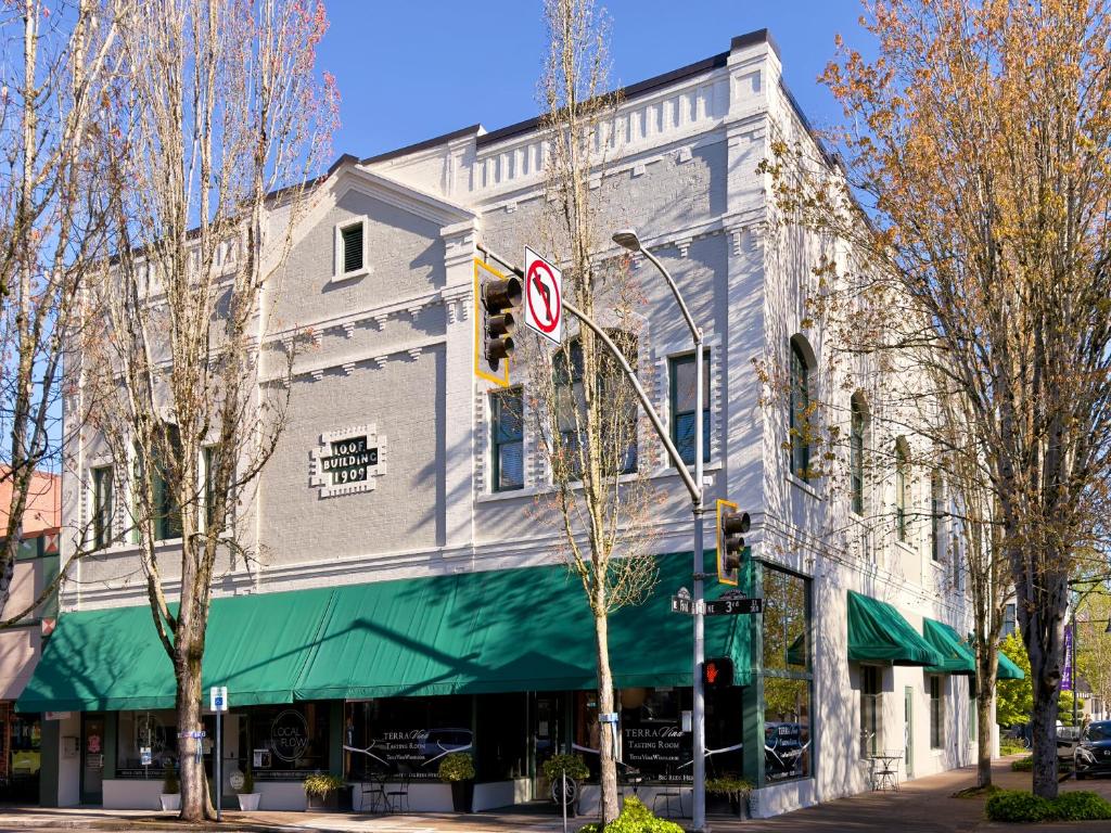 a building on a street corner with a no right turn sign at 3rd Street Flats in McMinnville