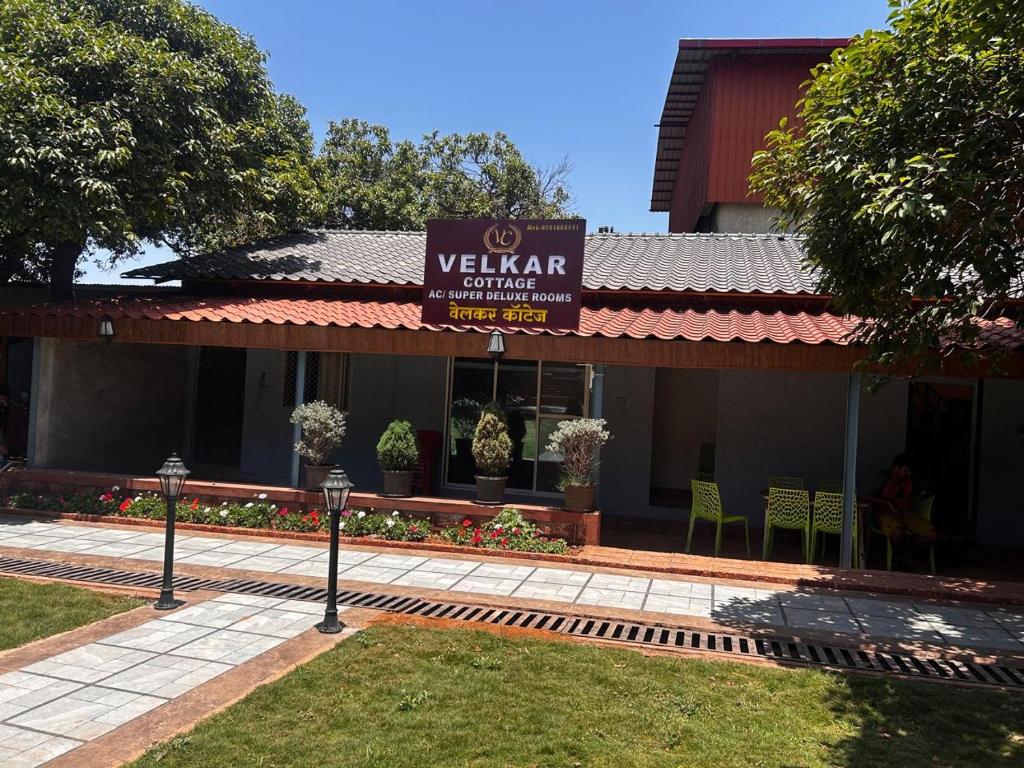 a building with a sign that reads vilsar cultural center at Velkar Cottage Mahabaleshwar in Mahabaleshwar