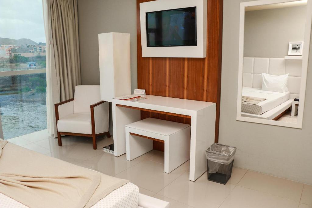 TV a/nebo společenská místnost v ubytování Hotel Vip Praia