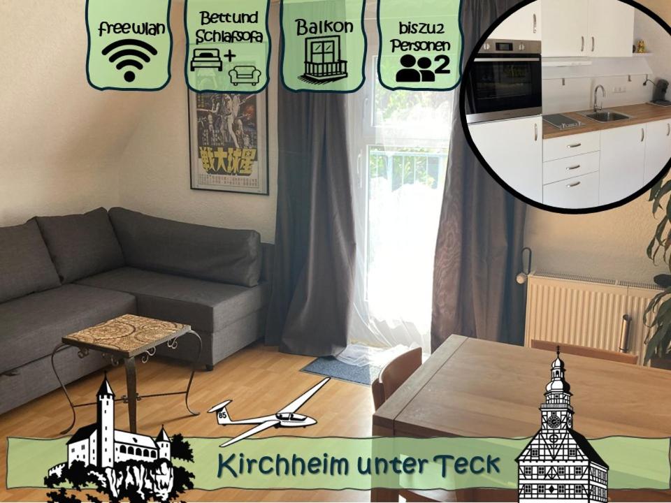 a living room with a couch and a table at RoDo Balcony - 2 Zimmer Apartment mit 1 Schlafzimmer & Balkon in Kirchheim unter Teck