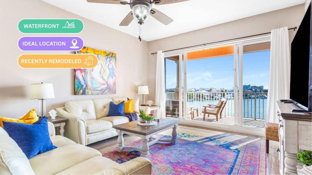a living room with a couch and a table at Harborview Oasis in Clearwater Beach in Clearwater Beach