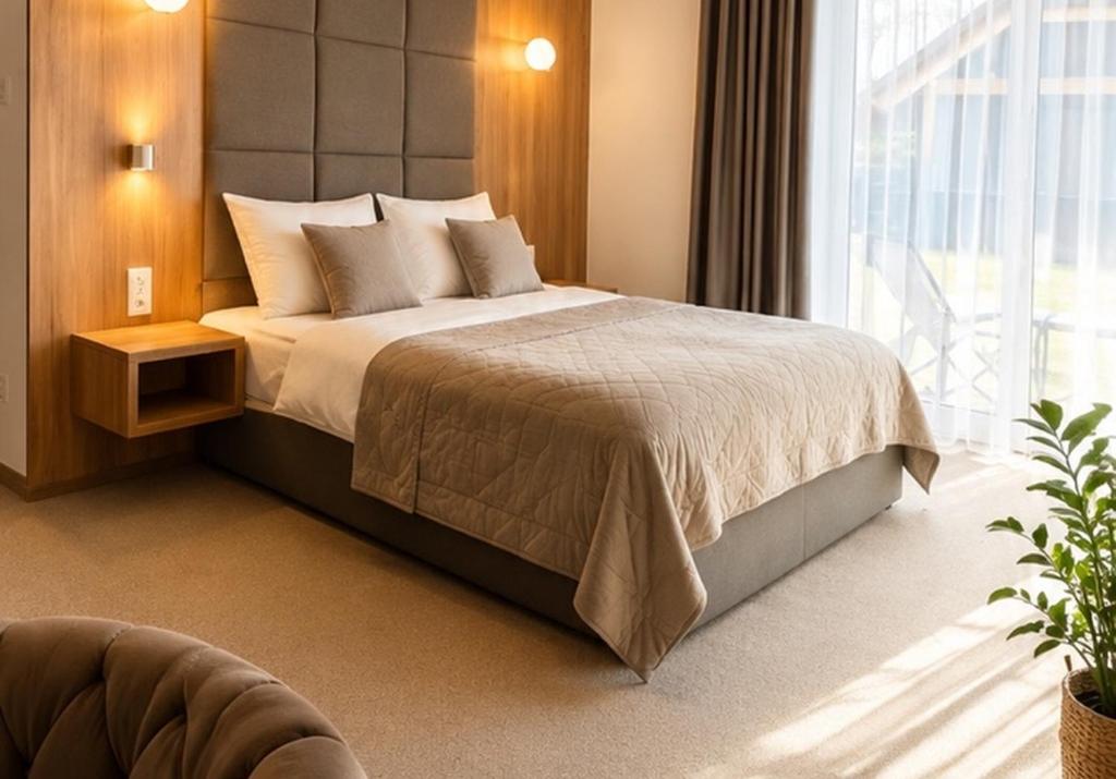 a bedroom with a bed and a large window at Eden Apartament-Jacuzzi, sauna in Jastrzębia Góra
