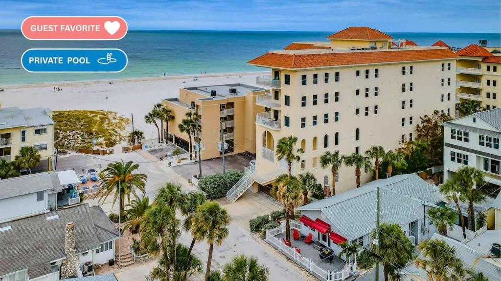 an aerial view of the beach and buildings at Starfish Beach House in Clearwater Beach