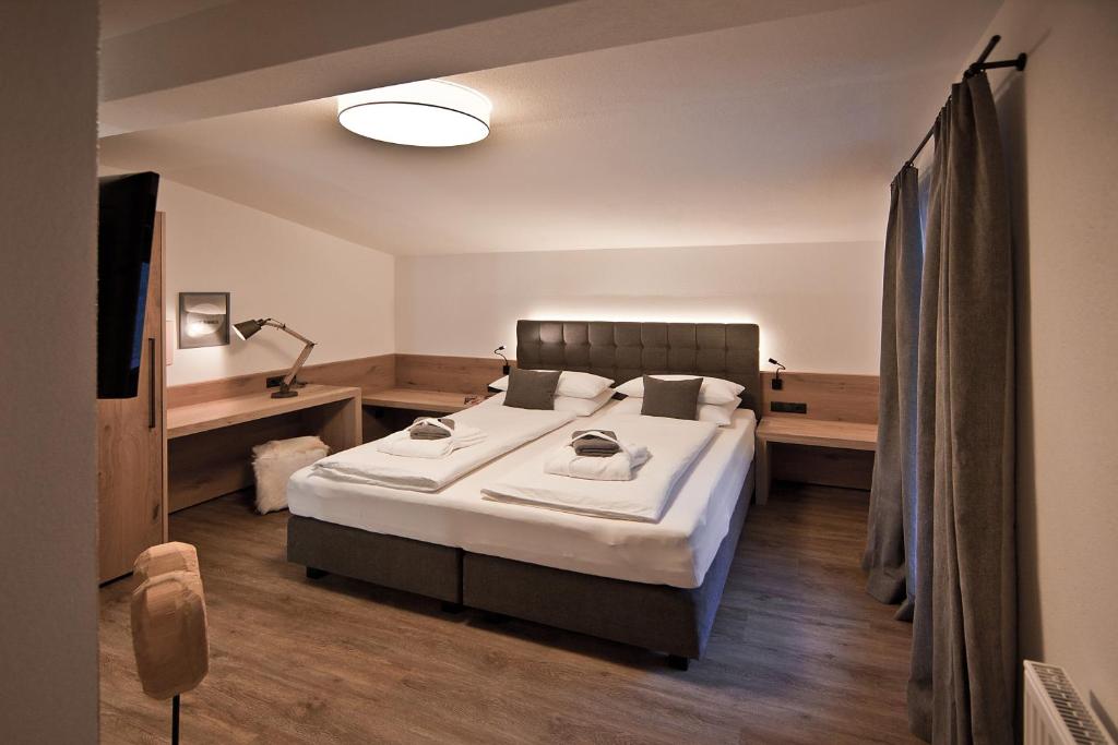 Postel nebo postele na pokoji v ubytování Villa Michaela