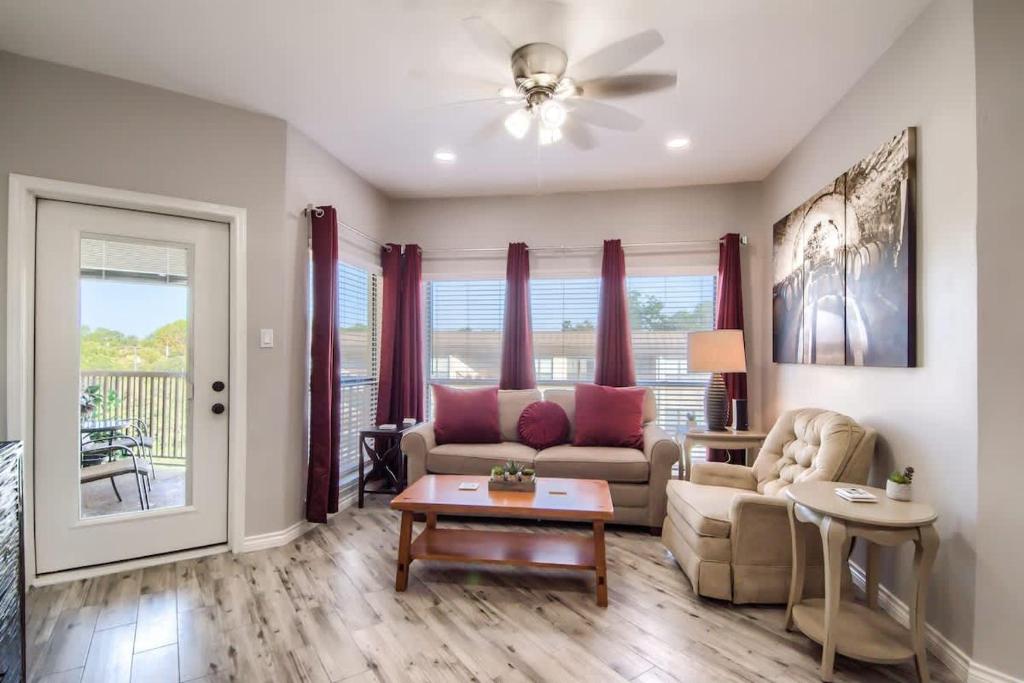 a living room with a couch and a table at IC 309 Wine Dine in New Braunfels