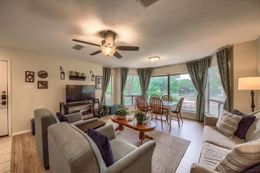 a living room with a couch and chairs and a table at CRC 317 Timeless Tranquility in New Braunfels