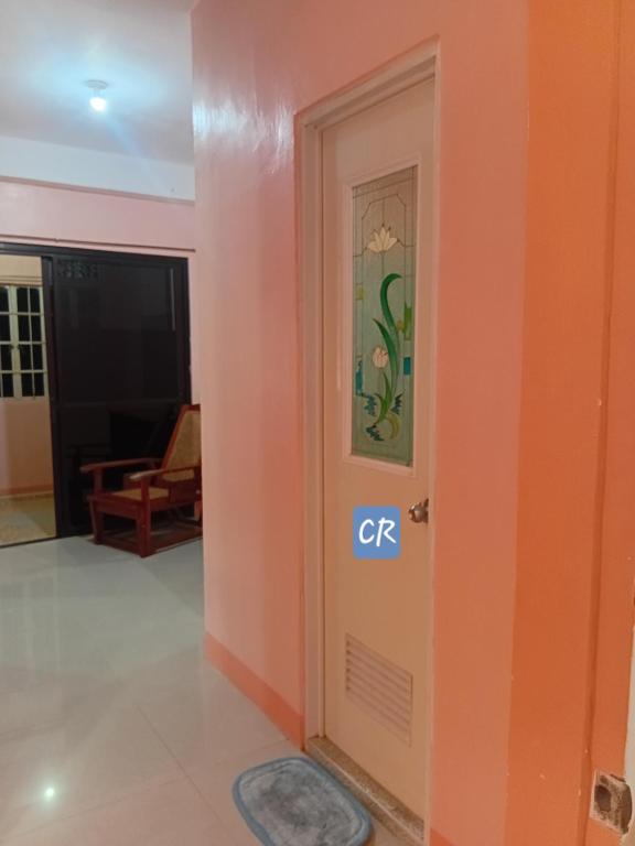 a door with the lettersctr on it in a room at Bato transient house in Bato