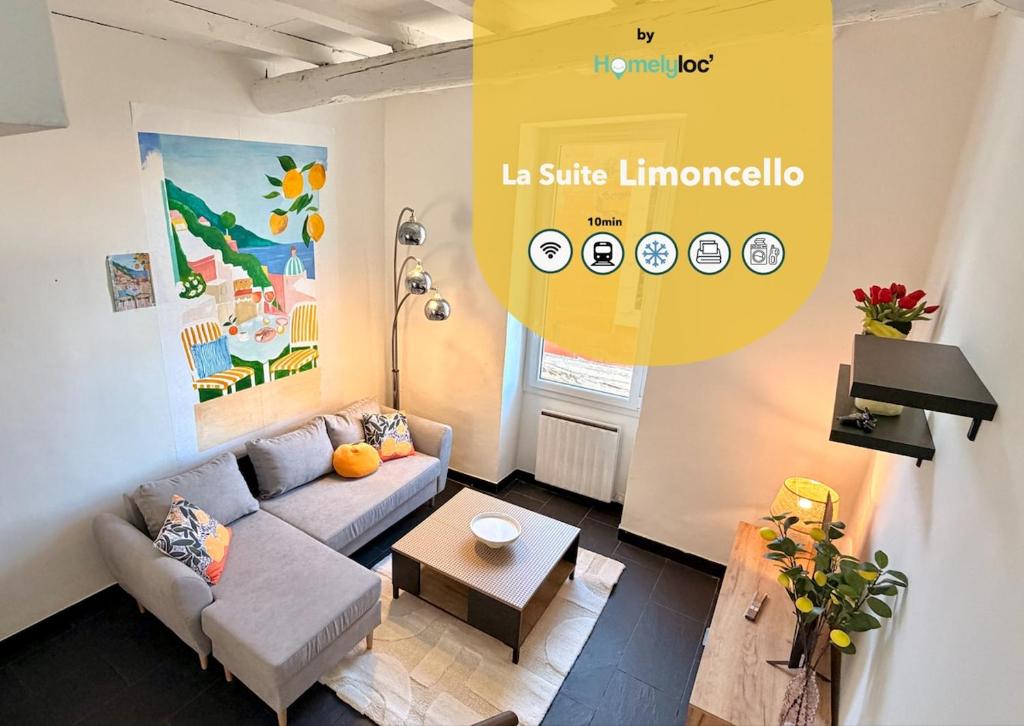 a living room with a couch and a table at La Suite Limoncello, Sunny & Spacious in Nîmes