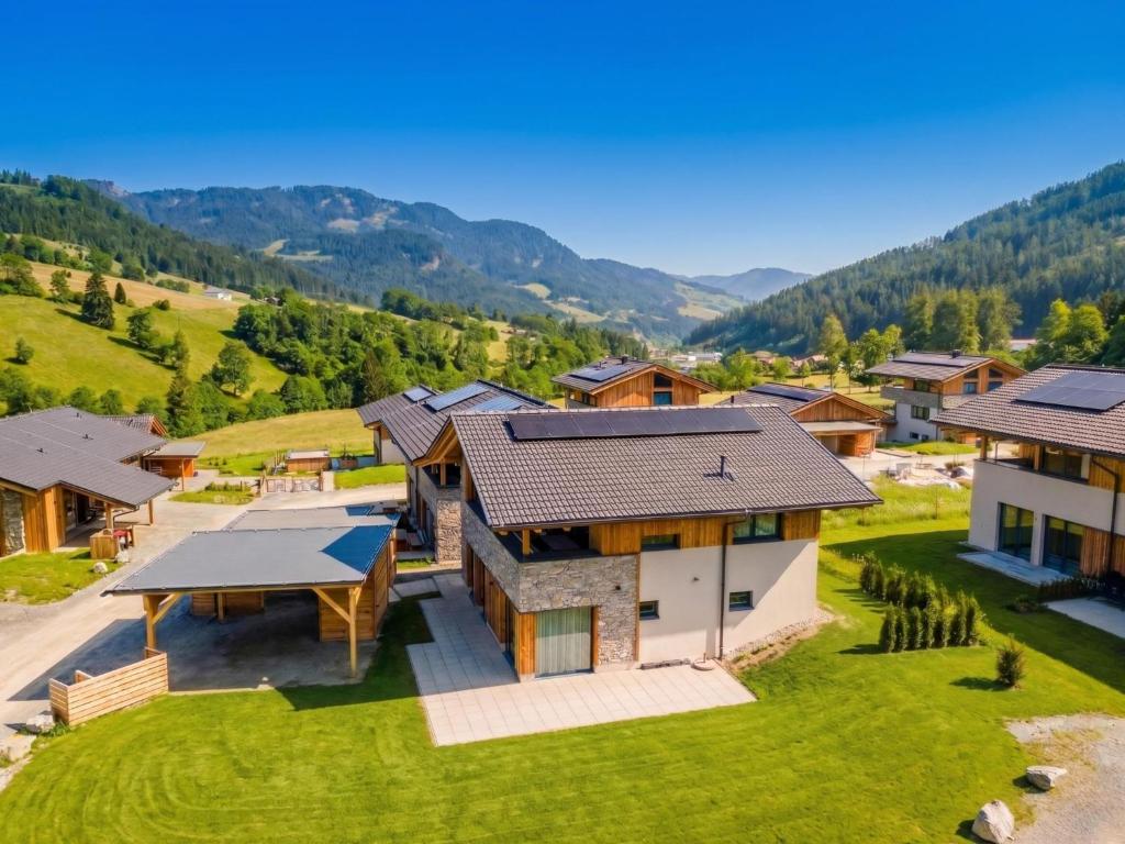 an aerial view of a house in the mountains at Birdie Lodge in Sankt Lambrecht