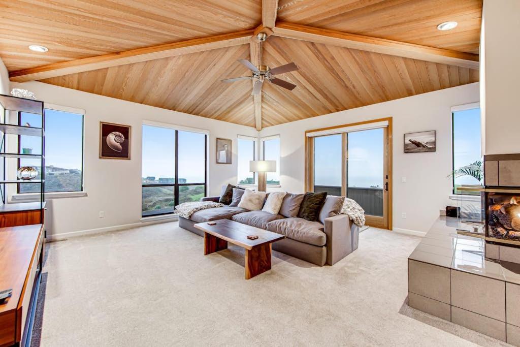 a living room with a couch and a table at Latitude 38 in Bodega Bay