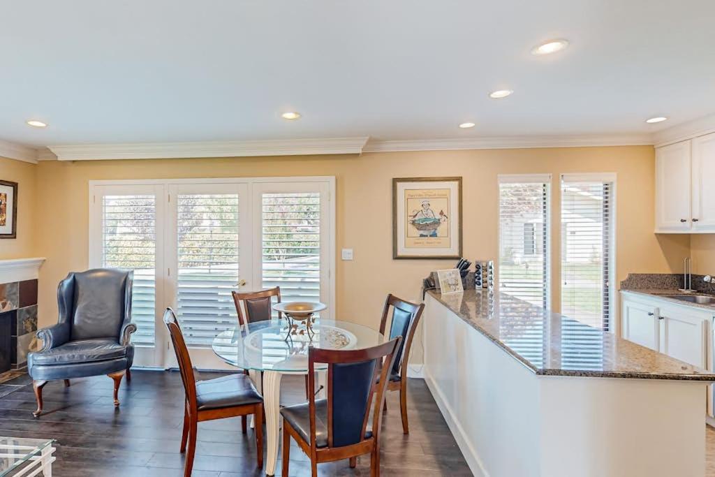 a kitchen and dining room with a table and chairs at Silverado Resort and Spa 381 in Napa