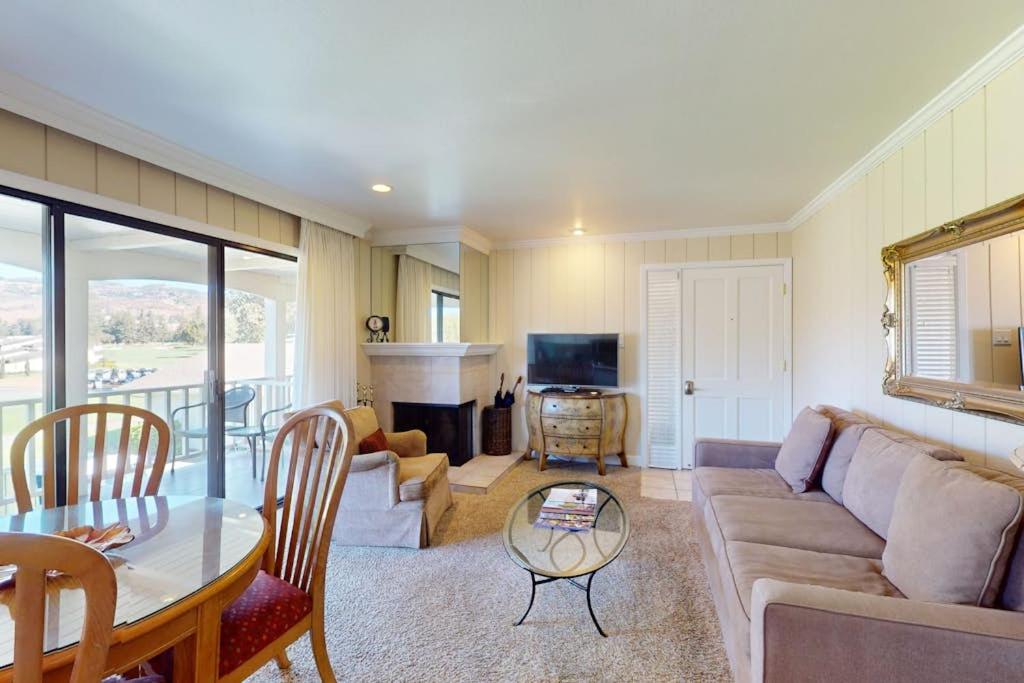 a living room with a couch and a table at Silverado Resort and Spa 266 in Napa