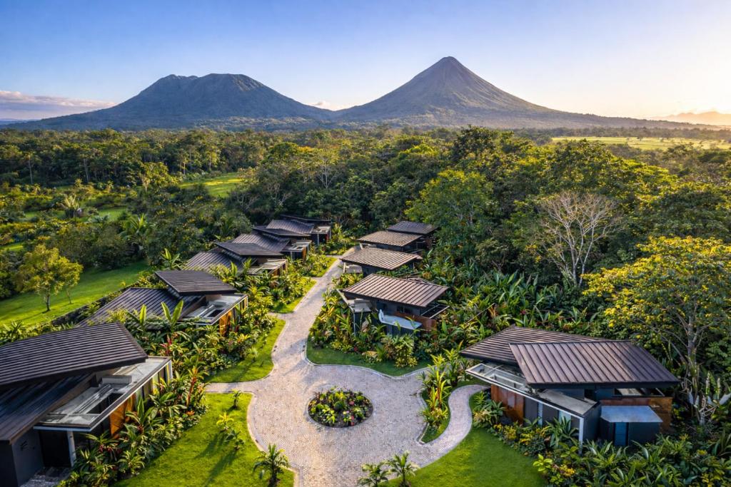 an aerial view of a resort with mountains in the background at Noah's Hideaway by Tifakara in Fortuna