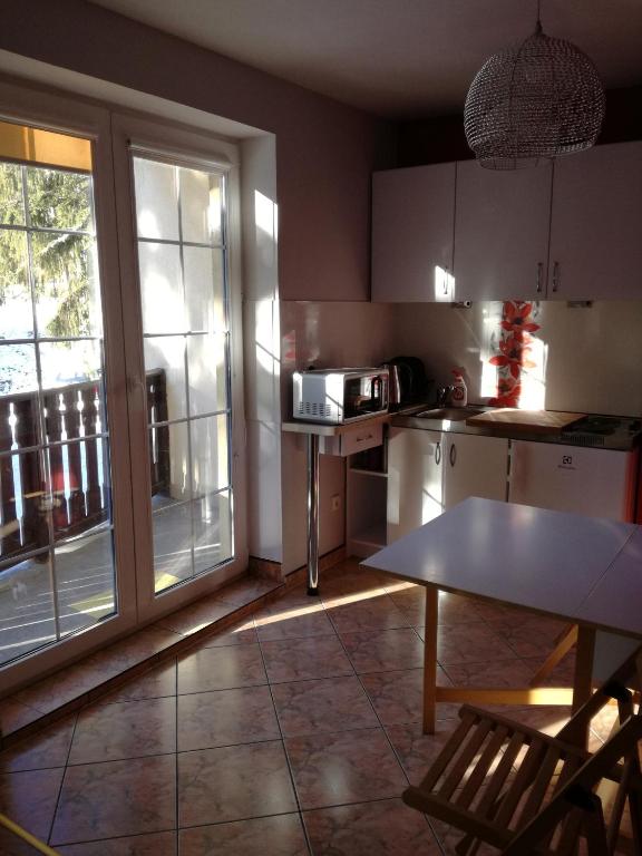 Kuchyňa alebo kuchynka v ubytovaní Apartament Patryk