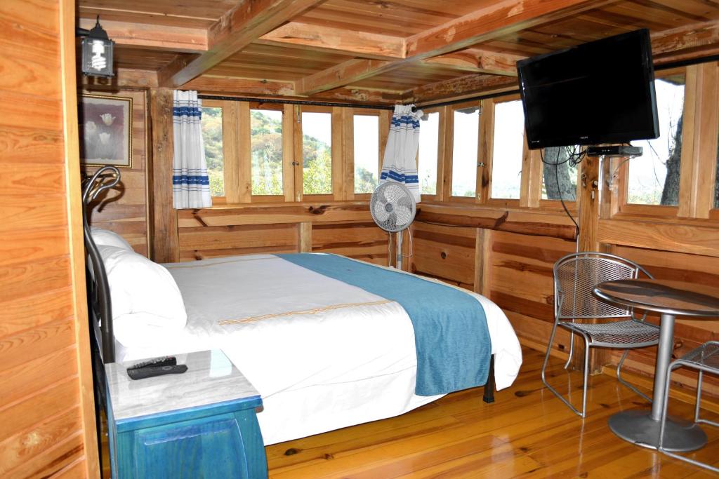 TV a/nebo společenská místnost v ubytování Cabañas el Chalet
