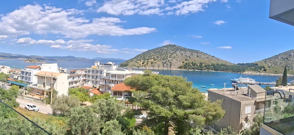 a view of a city and a body of water at Gesyl Apartment in Tolo