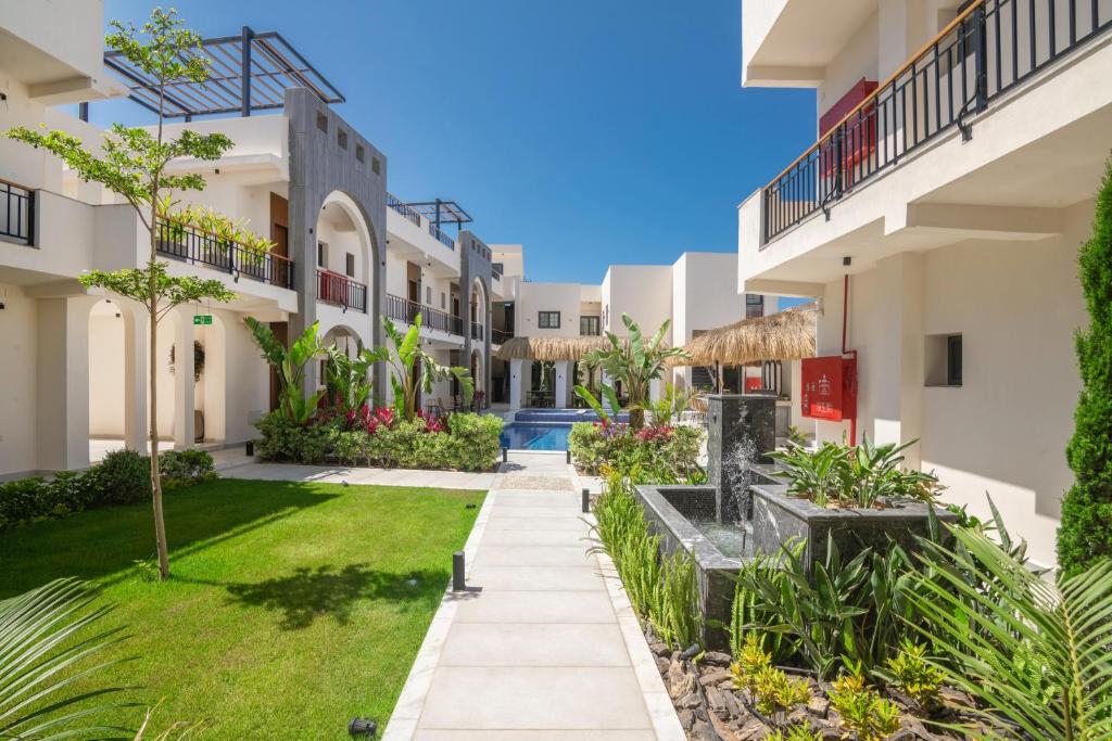 a view of the courtyard of a building at Santino Boutique Hotel in El Alamein