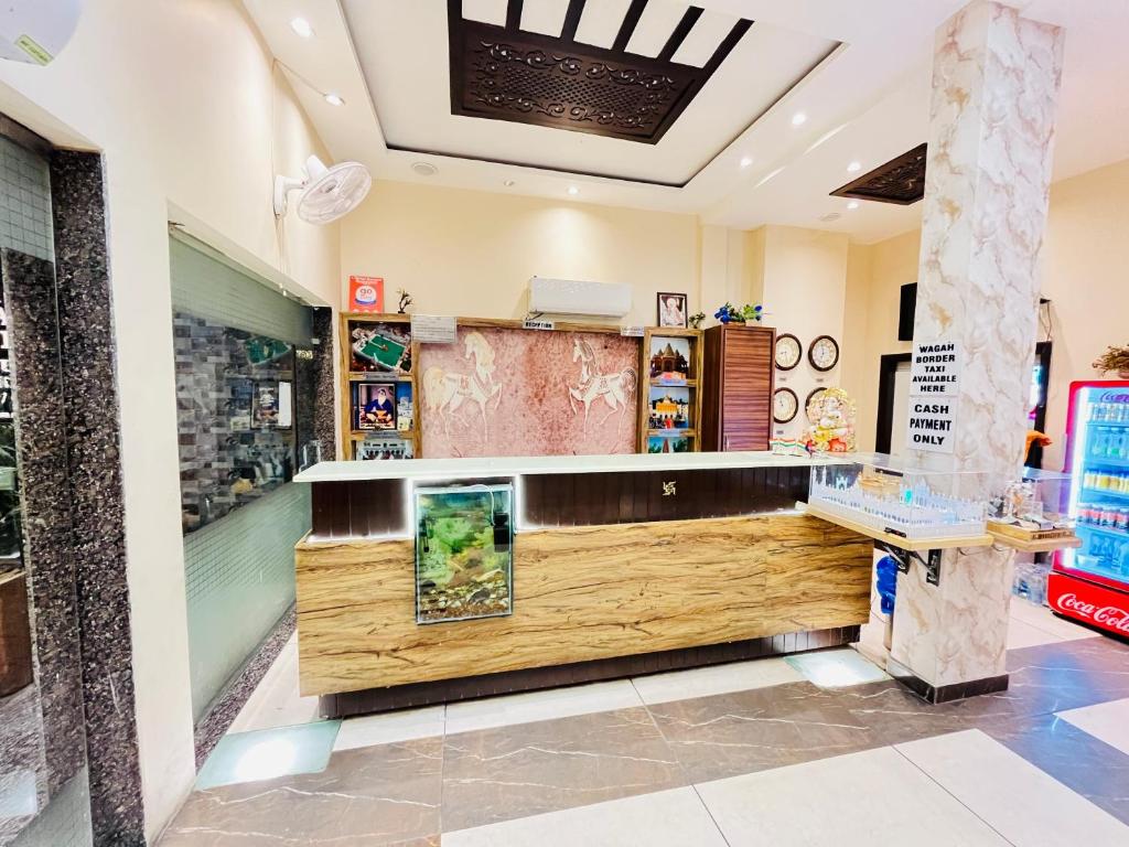 a shop with a counter in a room at Southern Stays in New Delhi