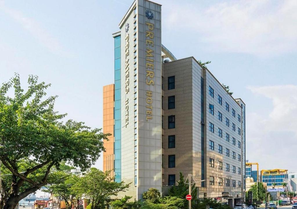 a tall building with the word hotel on it at Wolmido Premiers Hotel in Incheon