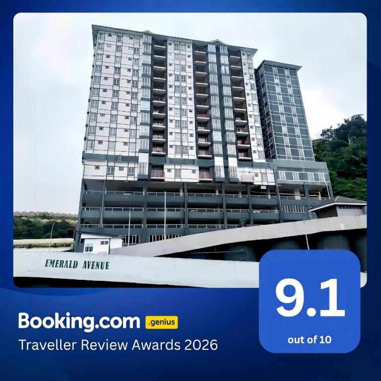 a picture of a tall building with a sign in front of it at Emerald Avenue Cameron Highlands in Brinchang