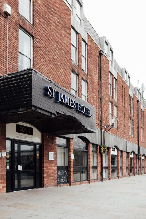 a brick building with a sign that reads stanleys house at St James Hotel in Grimsby