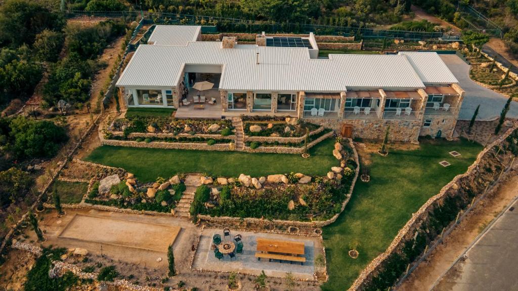 an aerial view of a house with a garden at Whale Coast Luxury Suites in Hermanus
