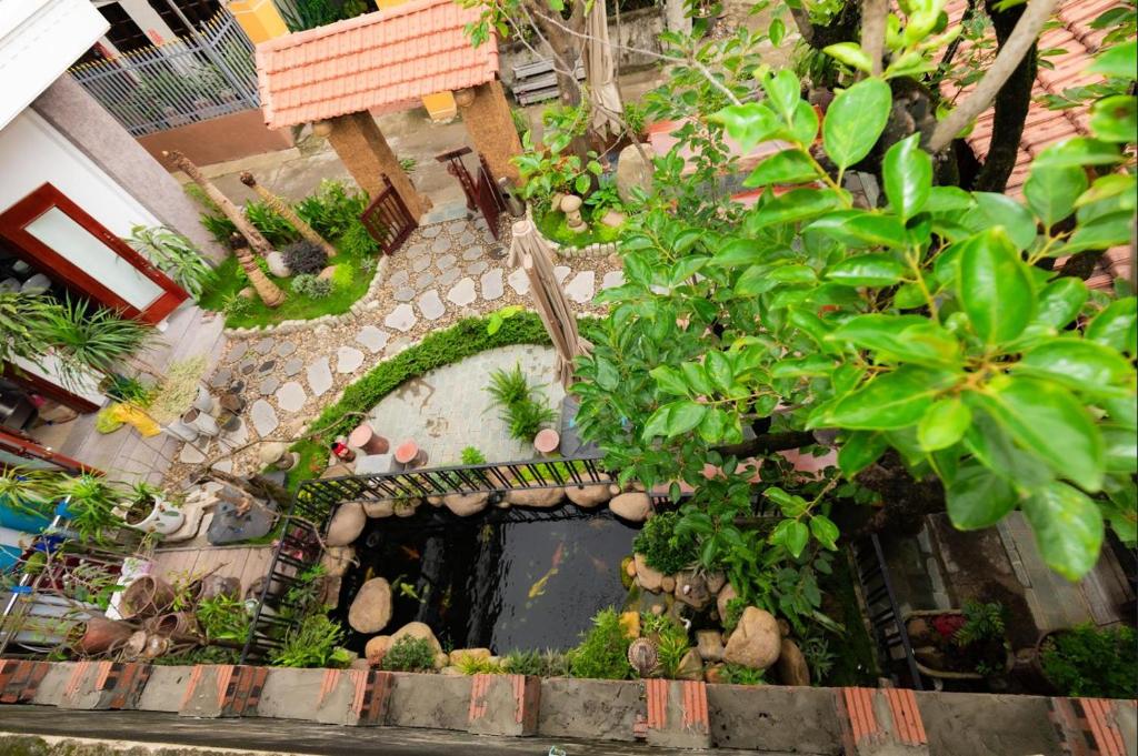an overhead view of a garden with trees and plants at Champs De Tam Coc Hotel in Vũ Lâm