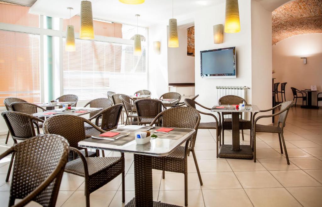 TV a/nebo společenská místnost v ubytování Hotel Vesuvio