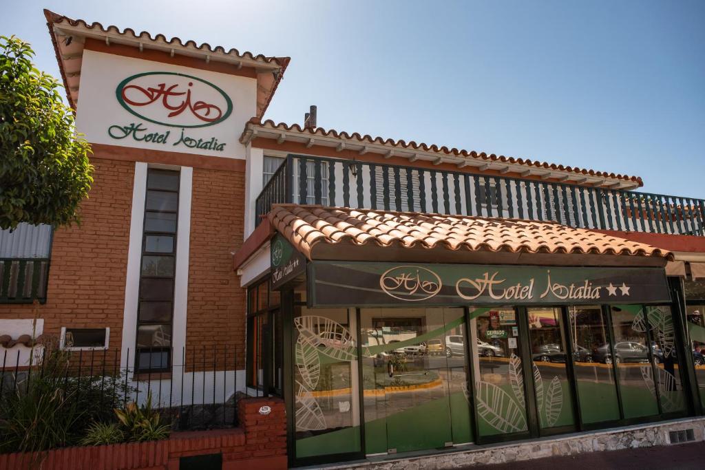 a store with a sign for a bike shop at Hotel ITALIA in La Falda
