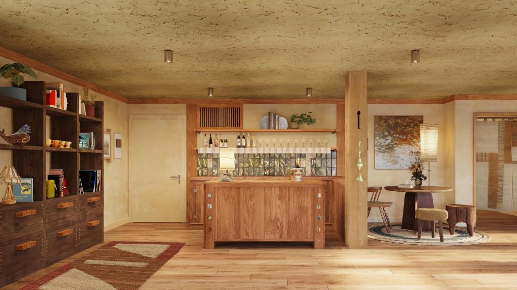a kitchen with a counter and a table in a room at Oyster Estate in Greenport