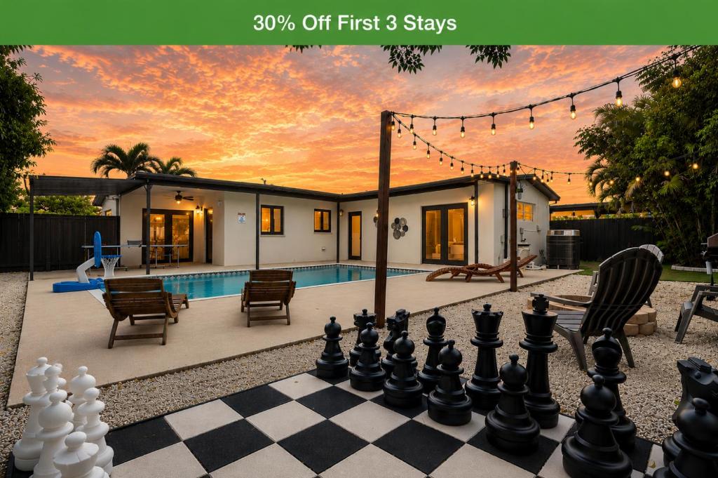a chess board in front of a house at Hollywood 4BR Home with Private Heated Pool in Hollywood