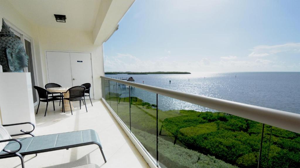 a balcony with a view of the water at 333 Mariners Club in Key Largo