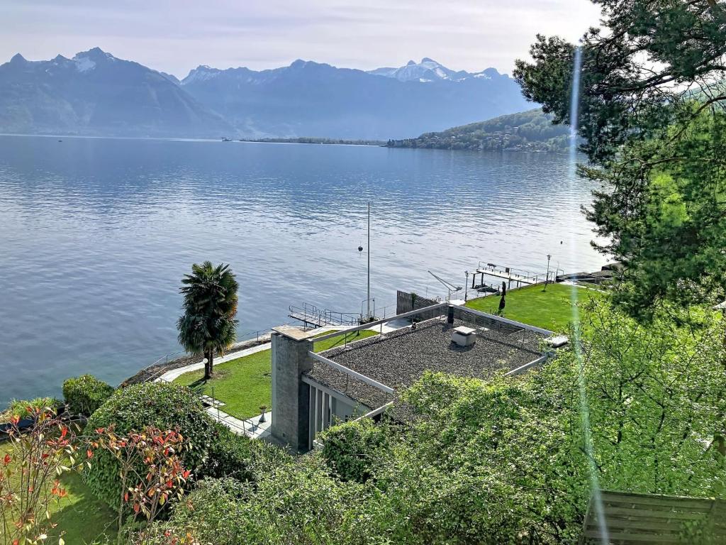 a view of a large body of water with mountains at Villa Villa Bikini by Interhome in Saint-Gingolph