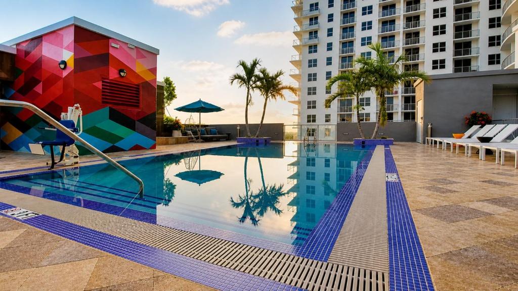 a pool at a hotel with a colorful building at Circ Hotel in Hollywood