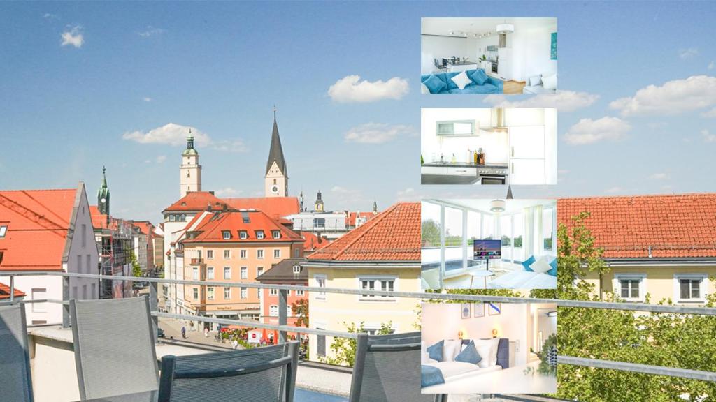 a view of a city from a balcony at JH Apartments Ingolstadt - Penthouse 105qm Dachterrasse in Ingolstadt