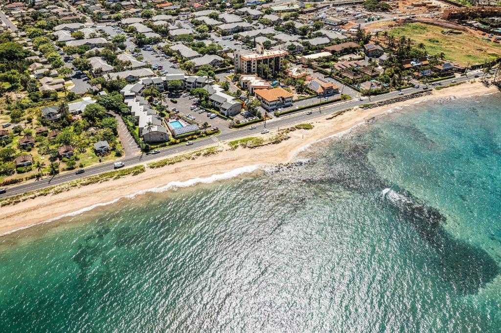 an aerial view of a beach with a resort at 103 Kihei Holiday in Kihei