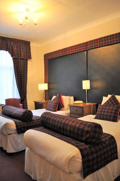 Postel nebo postele na pokoji v ubytování Argyll Hotel
