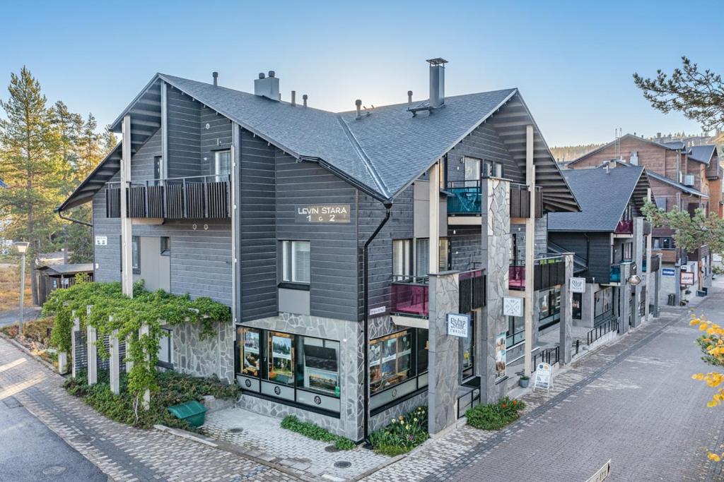 an apartment building on the side of a street at Lumi City Apartment in Levi